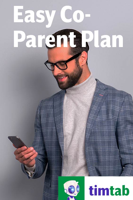 Co-parent reading email or text message on phone
