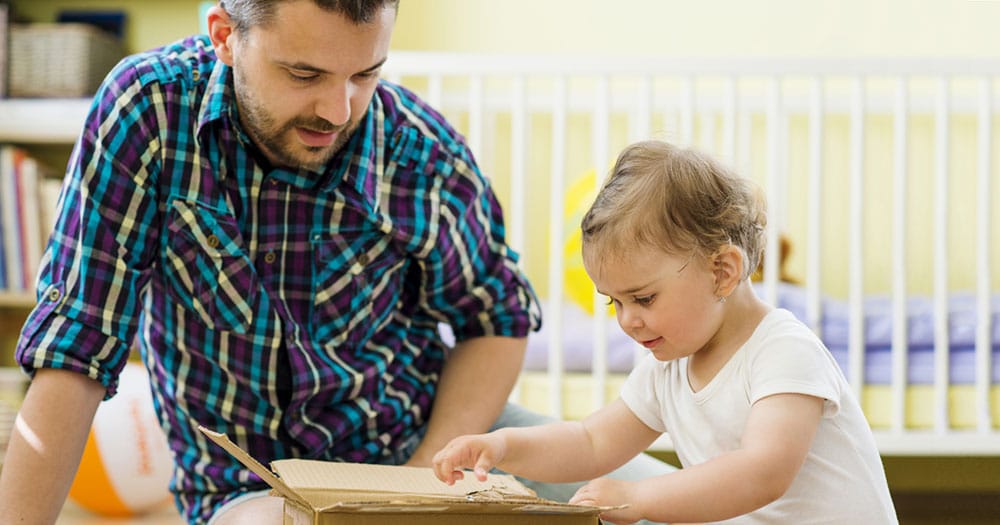 Father and child playing together